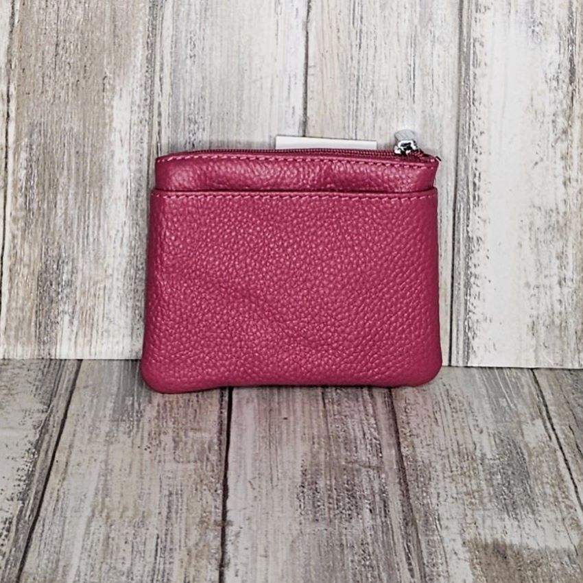 This Leather Zipper Coin Purse is convenient and stylish, featuring two front zip pockets, a back slip pocket, and a top zip pocket for easy access to coins, cards, and keys. Crafted from genuine leather, with a keyring attachment it's a functional and fashionable accessory.  L:11cm x H:9cm