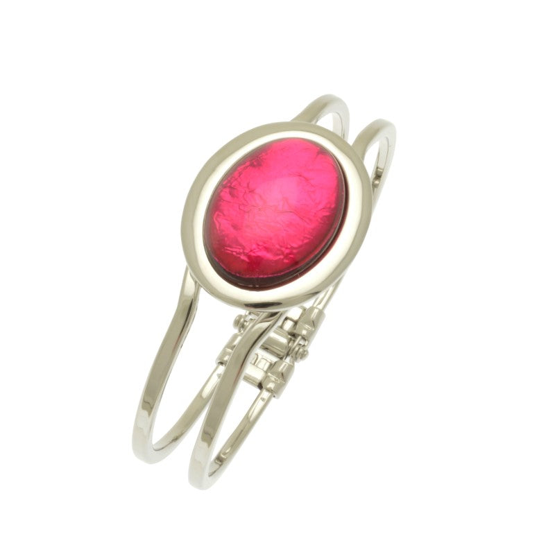 Bring glamour to any look with this one-size-fits-all Bright Pink Foil Resin Hinged Bangle. Made from a resin backed with aluminium foil, it has an illusion of depth and texture. Highlighted by a 3 cm by 2.5 cm oval decoration, this modern bangle is perfect for any occasion.