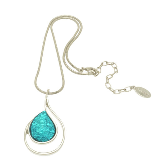 This turquoise foil necklace is a stunning accessory with a touch of artistry. The foil-backed resin gives it a unique texture and adds a luxurious shine.