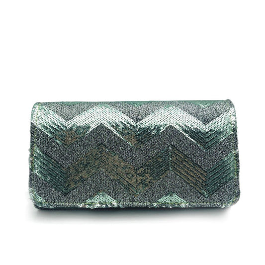 Make a grand entrance with the Zelina Diagonal Lines Evening Bag. The glitter effect and sequins add a touch of elegance, making it the perfect glamorous addition to any party outfit. The detachable chain strap adds practicality while the spacious interior offers room for all your essentials. Be stylish and sophisticated with Zelina.