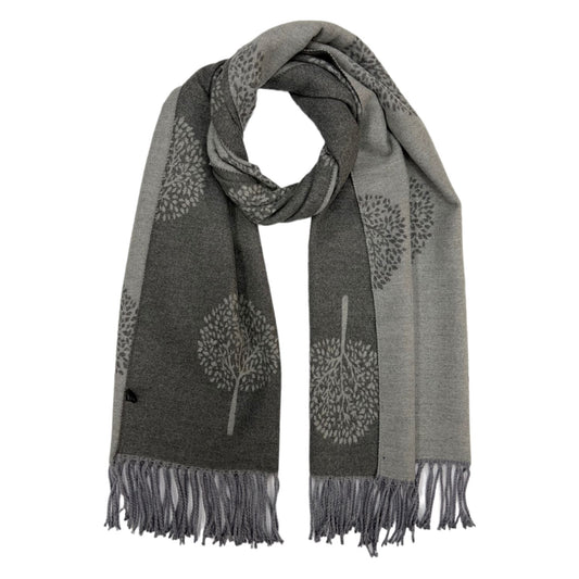This beautiful, reversible scarf is crafted from a luxurious cashmere blend, elegantly finished with tassels. The  tree of life print adds a sophisticated touch to this timeless piece, making it a perfect cozy addition to your look.     80% Viscose, 20% Cashmere  L: 180cm x W: 65cm 