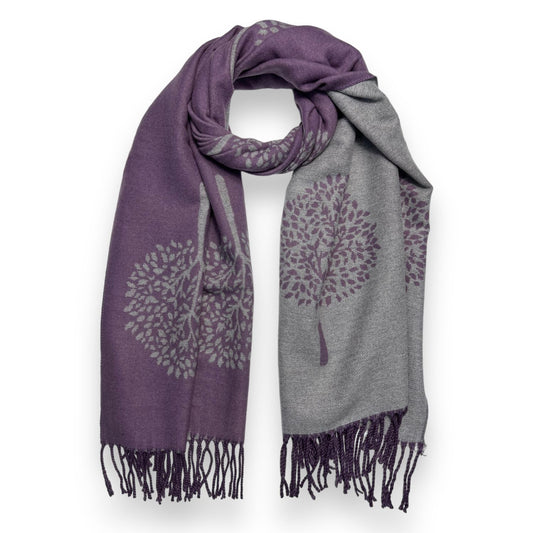 This beautiful, reversible scarf is crafted from a luxurious cashmere blend, elegantly finished with tassels. The  tree of life print adds a sophisticated touch to this timeless piece, making it a perfect cozy addition to your look.  30% Cashmere, 70% Acrylic  L: 180cm x W: 65cm 