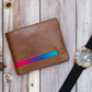This stylish LGBT leather wallet features 8 card slots and 2 note sections with RFID protection. Crafted from quality leather and finished with the iconic LGBT Pride colours this wallet is both stylish and safe.