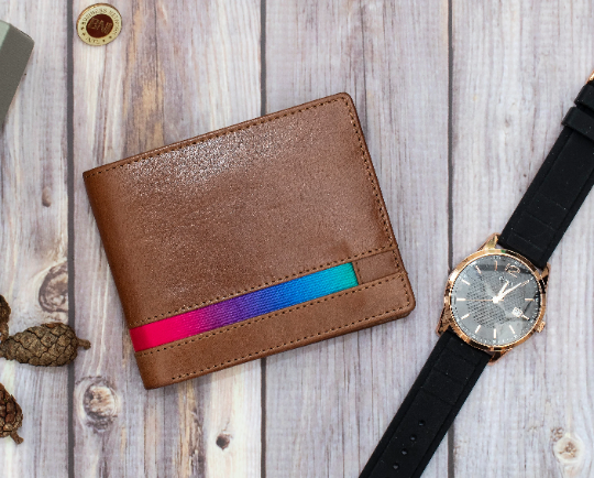 This stylish LGBT leather wallet features 8 card slots and 2 note sections with RFID protection. Crafted from quality leather and finished with the iconic LGBT Pride colours this wallet is both stylish and safe.