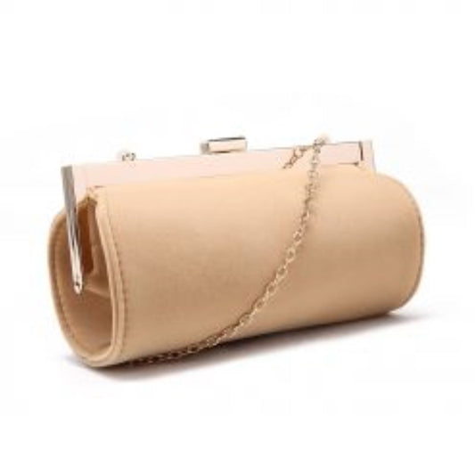 Introducing Polly Velvet Clutch Bag, inspired by 1950s design. Its small barrel shape, and elegant appearance make it a must-have accessory for any occasion. Use it as a clutch or attach the detachable chain strap for added versatility. Available in dark cream. Channel your inner vintage vixen with Polly!