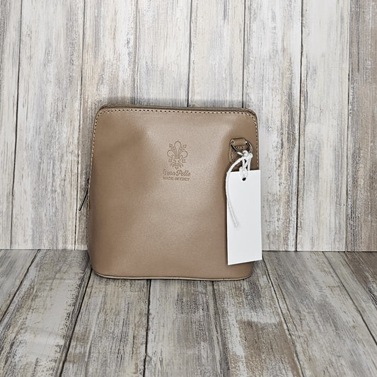 This stylish messenger bag is the ideal companion for your day-to-night looks, featuring detachable straps for easy transitions. Fully lined for convenience, a central zip compartment and an external zip pocket provide ample storage for all your needs.   Silver hardware   Detachable Strap    w:16cm x h:17cm x d: 8cm 