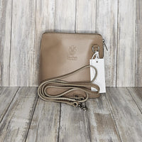 This stylish messenger bag is the ideal companion for your day-to-night looks, featuring detachable straps for easy transitions. Fully lined for convenience, a central zip compartment and an external zip pocket provide ample storage for all your needs.   Silver hardware   Detachable Strap    w:16cm x h:17cm x d: 8cm 