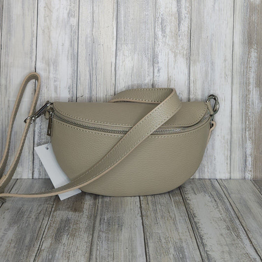 Made with soft&nbsp; Italian leather, our Sling Bag/Bum Bag is the perfect combination of chic and practical. Enjoy easy access to your essentials when you're on the go, and elevate your look with confidence!