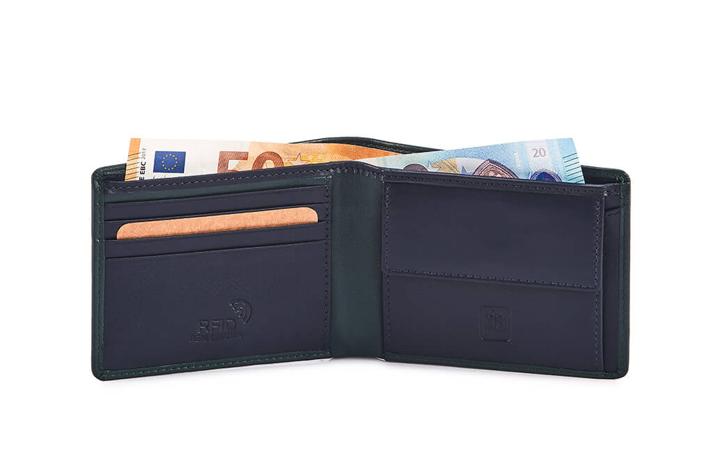 The Quinn Leather Bifold Wallet-3401/Green is an ideal choice for anyone looking for a sleek, stylish, and secure accessory. Its two tone design, bifold design, and RFID security offers an unparalleled combination of fashion and function. It also features 4 card slots, 2 note compartments, and a coin pocket to easily organize and store your essential items.  This item comes gift boxed.  11.5 x 9 x 3 cm