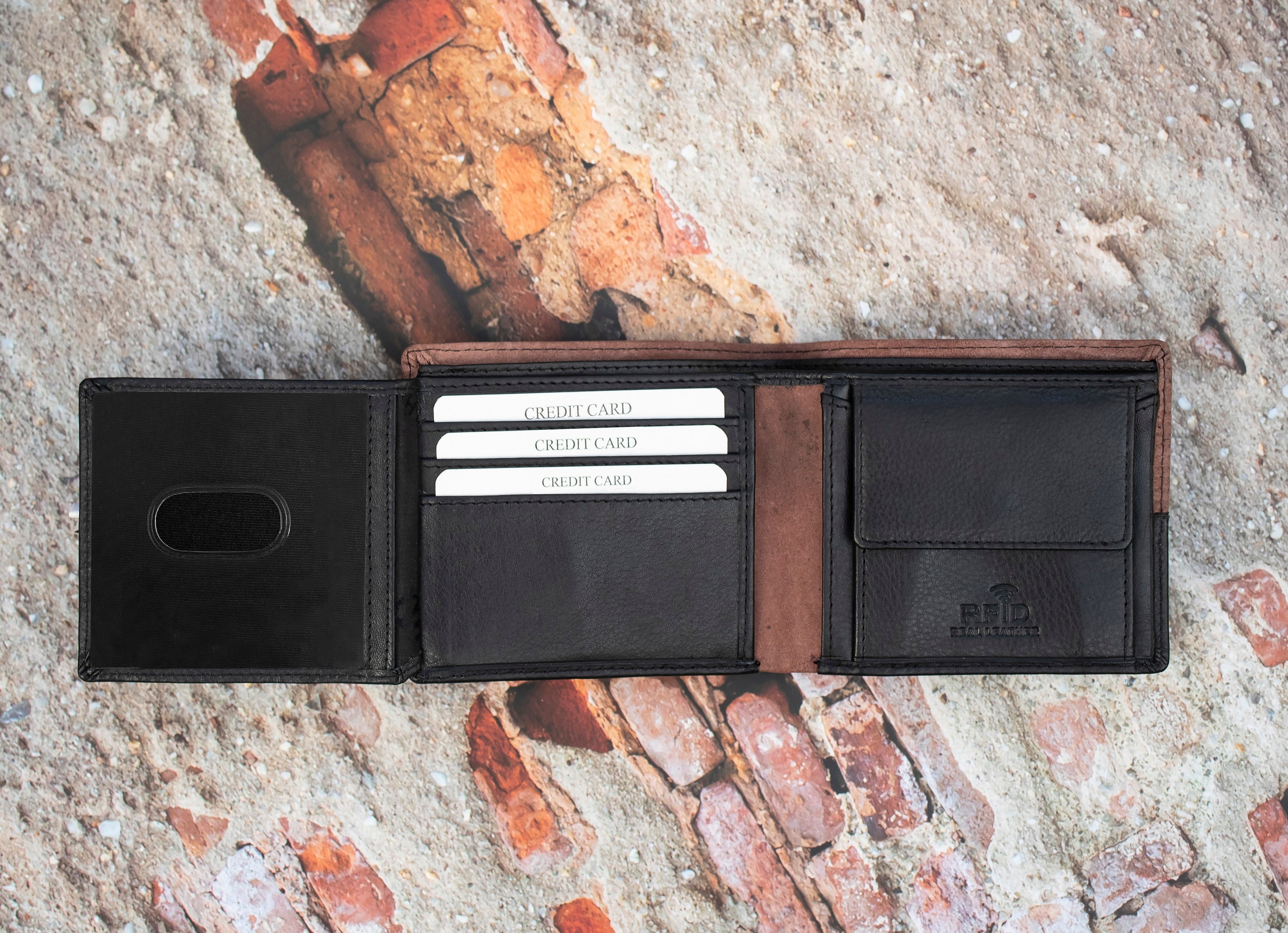 This  Trifold Leather Wallet is designed to maximize protection and organization. Featuring a trifold design with RFID blocking technology, this black and Brown leather wallet has 6 card slots, an ID window, a coin pocket, slip pockets, and 2 note compartments. Keep your personal information secure and organized with this stylish and functional wallet.  12 x 10 cm