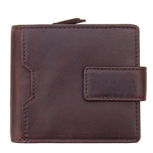 The Alperto wallet is the perfect accessory. Crafted from waxy buff leather and engineered with an RFID secure design, this bifold wallet offers exceptional security. Perfectly sized for cards, notes, and coins, the wallet features 4 card slots, an ID window, and a secure tab fastener. Plus, you can easily access your coins via the large, expandable zipped pocket.  This item comes gift boxed.  10 x 3 cm