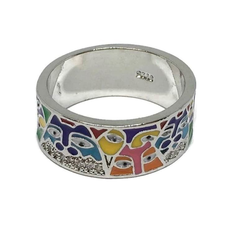 Dress to impress with this stylish unisex band! Its silver-plated steel alloy is adorned with colorful art deco faces, adding fun and flair to any outfit. Make a statement with this unique piece and show the world your inner artist!  Weight: 16g