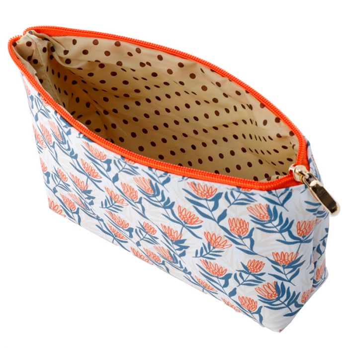 This pretty Protea design bag is perfect for cosmetics or as a small toiletry/washbag. Its made from durable PVC which means it easy to keep clean. Ideal fro everyday use or travelling.  L:23cm x H:14cm x D:5cm