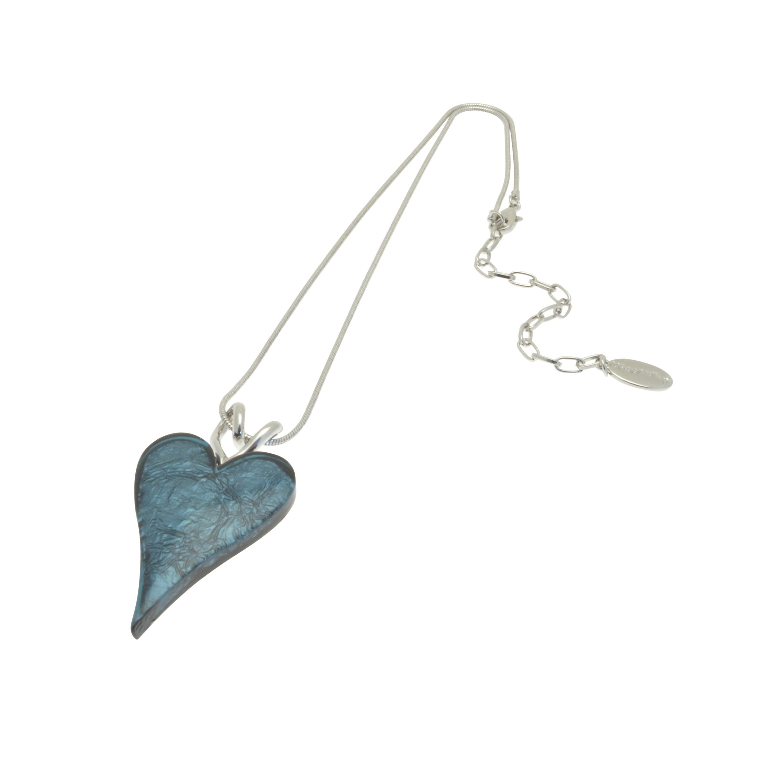 This beautiful Dark Teal Necklace is the perfect way to add subtle yet stylish sparkle to any outfit. Crafted with a lustrous foil-backed resin, the striking two-heart pendant is perfect for making a subtle statement. Wear it and dazzle!  The full pendant measures approx 2.8cm wide by 5.5cm high. The necklace measures 41cm or 16″ long and fastens with a lobster clasp and 8cm extension chain.