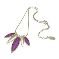 This beautiful leaf necklace is crafted of deep purple resin and tin foil for a unique, eye-catching finish. The vibrant hue is glossy and subtly shimmering, giving the piece an elegant, one-of-a-kind look.  The pendant comes with a 41cm snake chain and 8cm extender, secured with a lobster clasp.