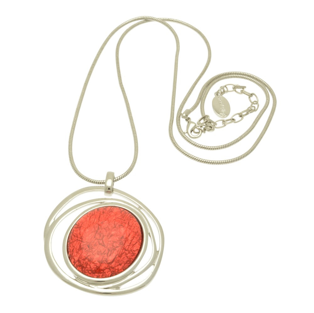 This eye-catching necklace is crafted with luxurious coral resin and a swirl of shiny silver, backed with aluminium foil for added depth and texture. Its unique 5cm by 4.5cm design hangs elegantly from a 75cm snake chain with a 5cm extender for a customised fit.