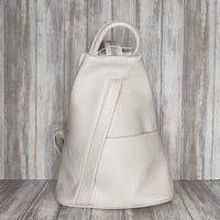 A beautiful soft and lightweight pebbled leather Italian backpack. These versatile backpacks can be carried in three ways, either by the loop handle at the top, over one shoulder, or by unzipping the strap and wearing as a classic backpack. Each bag is fully lined and comes in such a variety of gorgeous colours so you won't have any trouble choosing your favourite!  Front, back and inside pockets.  w25cm x h31cm x d14 cm 