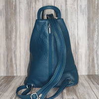 A beautiful soft and lightweight pebbled leather Italian backpack. These versatile backpacks can be carried in three ways, either by the loop handle at the top, over one shoulder, or by unzipping the strap and wearing as a classic backpack. Each bag is fully lined and comes in such a variety of gorgeous colours so you won't have any trouble choosing your favourite!  Front, back and inside pockets.  w25cm x h31cm x d14 cm 