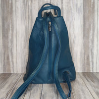 A beautiful soft and lightweight pebbled leather Italian backpack. These versatile backpacks can be carried in three ways, either by the loop handle at the top, over one shoulder, or by unzipping the strap and wearing as a classic backpack. Each bag is fully lined and comes in such a variety of gorgeous colours so you won't have any trouble choosing your favourite!  Front, back and inside pockets.  w25cm x h31cm x d14 cm 