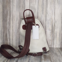 Another beautifully soft and lightweight leather Italian backpack, but this time a smaller version of our large backpack. This small backpack is equally as versatile and can be worn in the same main three ways, either by the loop handle at the top, over one shoulder, or by unzipping the strap and wearing as a classic backpack. You can also unclip the straps of these smaller ones and wear them as a cross body!  Each bag is fully lined with front, back and inside pockets.   w22cm x d23cm x h12cm