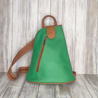 Another beautifully soft and lightweight leather Italian backpack, but this time a smaller version of our large backpack. This small backpack is equally as versatile and can be worn in the same main three ways, either by the loop handle at the top, over one shoulder, or by unzipping the strap and wearing as a classic backpack. You can also unclip the straps of these smaller ones and wear them as a cross body!  Each bag is fully lined with front, back and inside pockets.   w22cm x d23cm x h12cm