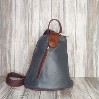 Another beautifully soft and lightweight leather Italian backpack, but this time a smaller version of our large backpack. This small backpack is equally as versatile and can be worn in the same main three ways, either by the loop handle at the top, over one shoulder, or by unzipping the strap and wearing as a classic backpack. You can also unclip the straps of these smaller ones and wear them as a cross body!  Each bag is fully lined with front, back and inside pockets.   w22cm x d23cm x h12cm