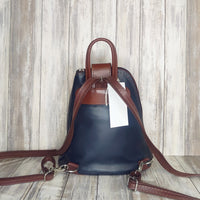 Another beautifully soft and lightweight leather Italian backpack, but this time a smaller version of our large backpack. This small backpack is equally as versatile and can be worn in the same main three ways, either by the loop handle at the top, over one shoulder, or by unzipping the strap and wearing as a classic backpack. You can also unclip the straps of these smaller ones and wear them as a cross body!  Each bag is fully lined with front, back and inside pockets.   w22cm x d23cm x h12cm