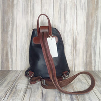 Another beautifully soft and lightweight leather Italian backpack, but this time a smaller version of our large backpack. This small backpack is equally as versatile and can be worn in the same main three ways, either by the loop handle at the top, over one shoulder, or by unzipping the strap and wearing as a classic backpack. You can also unclip the straps of these smaller ones and wear them as a cross body!  Each bag is fully lined with front, back and inside pockets.   w22cm x d23cm x h12cm