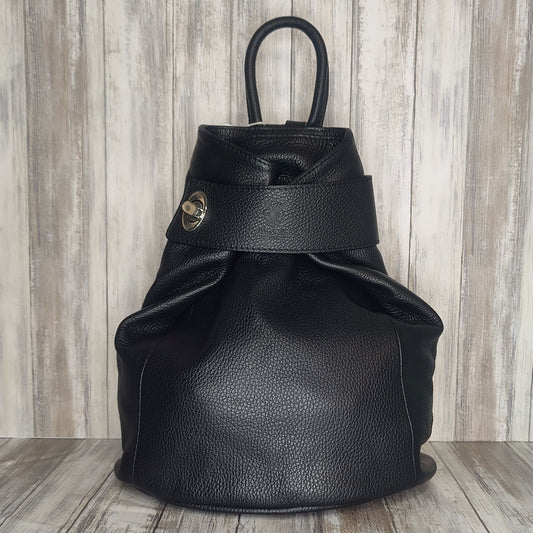 Discover the perfect blend of style and convenience with this Italian leather postman's lock backpack! Its sumptuous, pebbled leather offers timeless sophistication and makes a bold statement wherever you go. Keep your belongings safe and secure with both the postman's lock and zip closure. And with its spacious design, you'll have plenty of room to store your everyday essentials.   Adjustable straps   Grab handle   Fully lined   Back zip pocket   Internal zip pocket   h35cm x w33cm x d13cm 