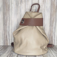 Discover the perfect blend of style and convenience with this Italian leather postman's lock backpack! Its sumptuous, pebbled leather offers timeless sophistication and makes a bold statement wherever you go. Keep your belongings safe and secure with both the postman's lock and zip closure. And with its spacious design, you'll have plenty of room to store your everyday essentials.   Adjustable straps   Grab handle   Fully lined   Back zip pocket   Internal zip pocket   h35cm x w33cm x d13cm 