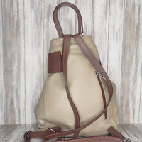 Discover the perfect blend of style and convenience with this Italian leather postman's lock backpack! Its sumptuous, pebbled leather offers timeless sophistication and makes a bold statement wherever you go. Keep your belongings safe and secure with both the postman's lock and zip closure. And with its spacious design, you'll have plenty of room to store your everyday essentials.   Adjustable straps   Grab handle   Fully lined   Back zip pocket   Internal zip pocket   h35cm x w33cm x d13cm 