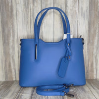 Elevate your style with this stunning Italian leather double compartment handbag.  Its soft yet structured design looks beautiful and feels equally beautiful to wear. This is a classic design that will match with any outfit and is the perfect size for all your essential items. Get ready to make a statement with this fashionable and functional addition to your wardrobe.  We love this bag!