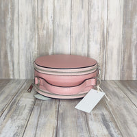 This stylish Italian leather round grab bag is an essential addition to any wardrobe. With a two-zip closure and unique shape, it is a versatile accessory for any occasion. The bag also features a convenient grab handle as well as a detachable long crossbody strap.   Maximum handle drop 60cm   Silver hardware   h:19cm x w19cm x d8cm 