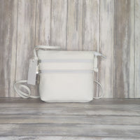 Carry everyday essentials in style with this multi zip Italian leather handbag. Crafted with a soft leather, this cross-body bag features a number of compartments for easy access and an effortlessly chic look. Perfect for bringing style and convenience to your day!  Silver Hardware  l:20CM h:18CM d:6CM