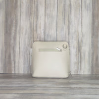 This stylish messenger bag is the ideal companion for your day-to-night looks, featuring detachable straps for easy transitions. Fully lined for convenience, a central zip compartment and an external zip pocket provide ample storage for all your needs.   Silver hardware   Detachable Strap    w:16cm x h:17cm x d: 8cm 