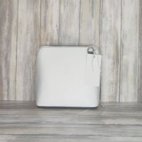 This stylish messenger bag is the ideal companion for your day-to-night looks, featuring detachable straps for easy transitions. Fully lined for convenience, a central zip compartment and an external zip pocket provide ample storage for all your needs.   Silver hardware   Detachable Strap    w:16cm x h:17cm x d: 8cm 