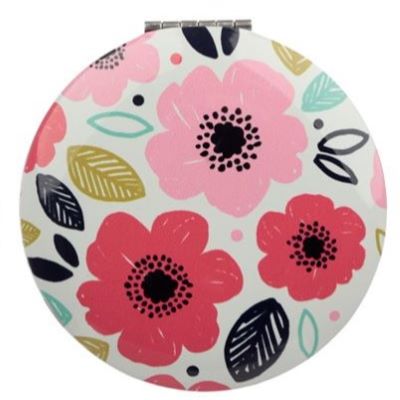 This Botanical Compact Mirror is the perfect choice for when you need to freshen up on-the-go. Featuring two mirrors including one magnifying mirror, all with a stylish Poppy design, this compact is a handbag essential.  H: 6.5cm x W: 6.5cmx D:1cm  Metal and Glass