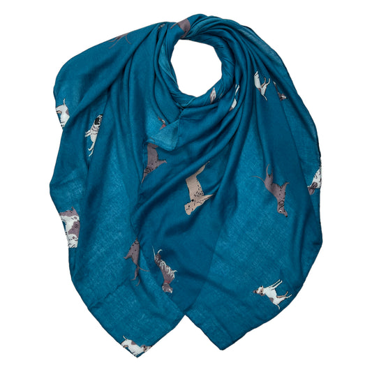 This Dog Print Scarf in Teal is the perfect way to show off your pup loving style. Crafted from soft and lightweight fabric, this scarf features a stylish dog print that will add a playful touch to any outfit. It's the perfect accessory for any dog lover!