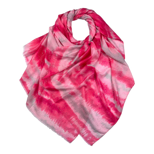 Our pink scarf features elegant abstract brush strokes, accented with delicate gold sparkles. Wrapping yourself in this beautiful accessory will add a touch of sophistication and style to any ensemble. Embrace your inner artist!