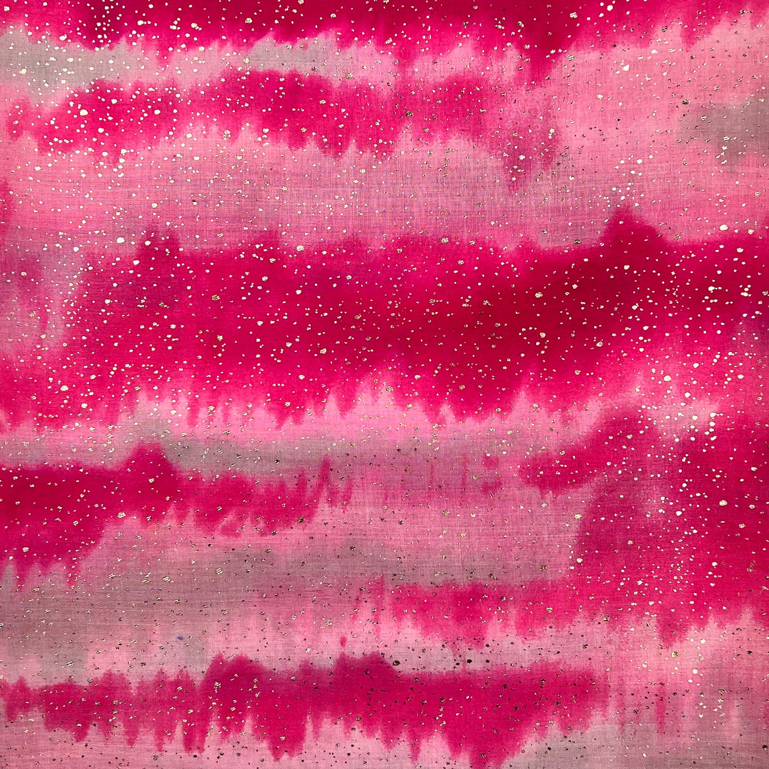 Our pink scarf features elegant abstract brush strokes, accented with delicate gold sparkles. Wrapping yourself in this beautiful accessory will add a touch of sophistication and style to any ensemble. Embrace your inner artist!