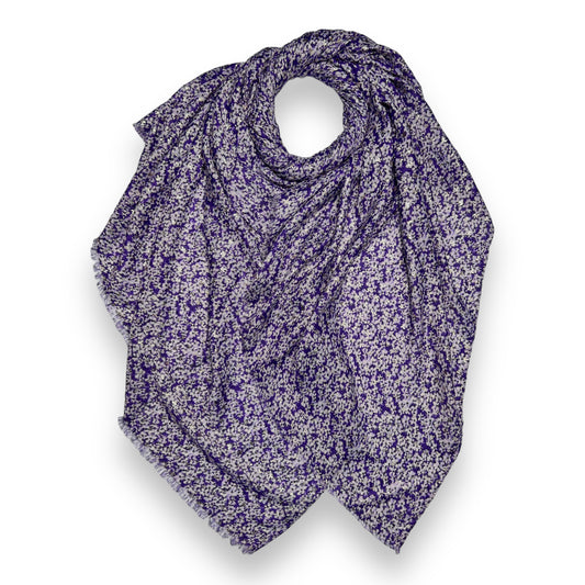 This purple Lobelia print scarf is perfect for adding a pretty touch to any outfit.