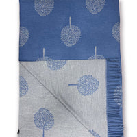 This beautiful, reversible scarf is crafted from a luxurious cashmere blend, featuring a striking denim hue and elegantly finished with tassels. The  tree of life print adds a sophisticated touch to this timeless piece, making it a perfect cozy addition to your look.     80% Viscose, 20% Cashmere  L: 180cm x W: 65cm 