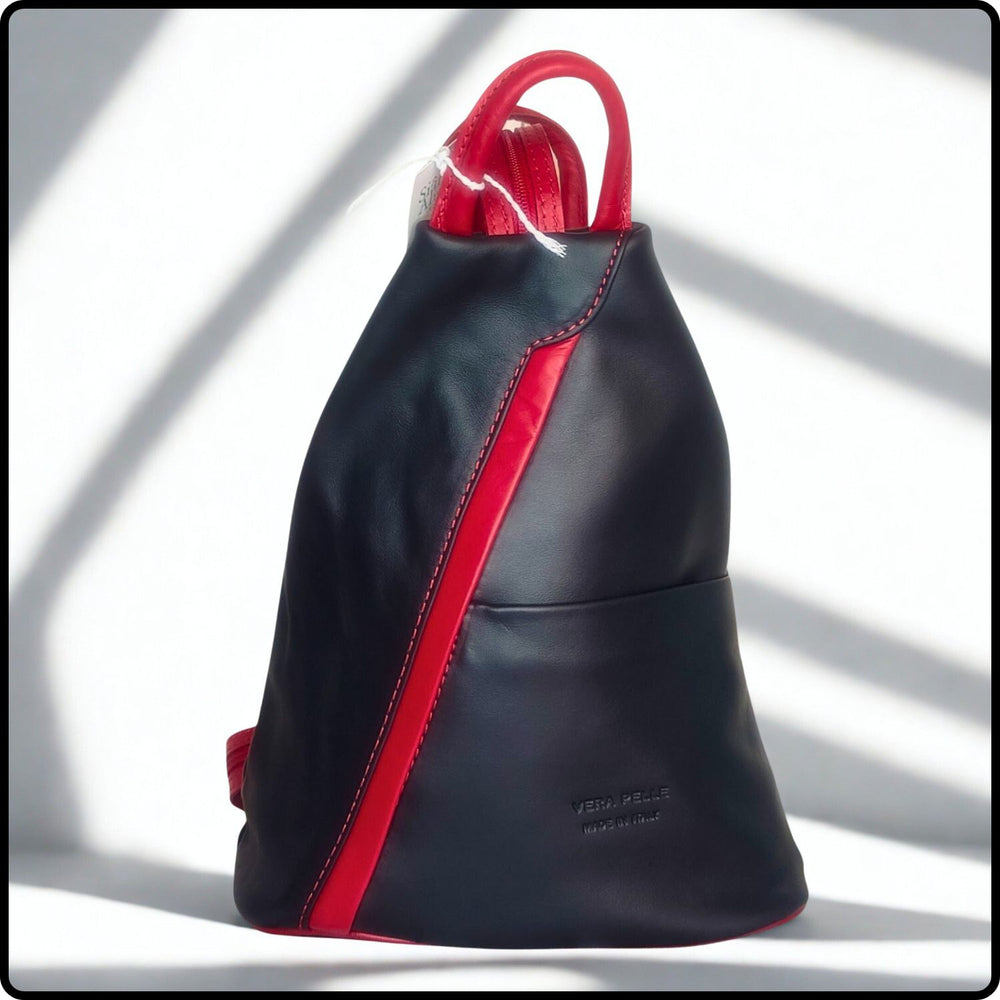 Black backpack with red accents on a white background