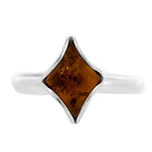 A beautiful small diamond amber ring on thin silver band, absolutely perfect for everyday wear.  This ring is only available in a size N(7).  The decorative part of the ring measures width 8mm, height 13mm and depth 3mm. The band measures 2mm. All measurements are approximate and measured at widest/longest point.  Delivered gift boxed.