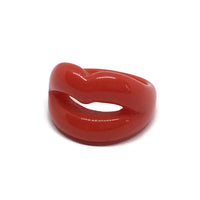 Show off your love of Rocky Horror with the Rocky Horror Resin Lips Ring! The eye-catching red statement design is fun and entertaining, adding a pop of fun to any outfit.   Size N