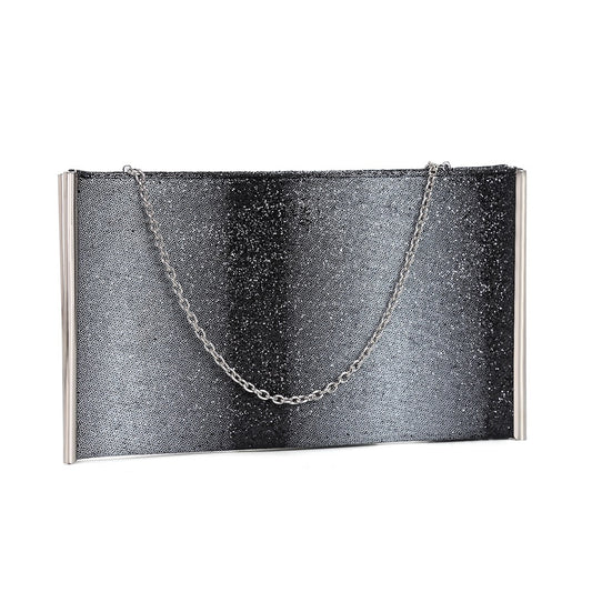 Indulge in luxury with the Anita Evening Bag. This elegant clutch offers ample room for your essentials while maintaining a sleek profile. Its double compartments allow for easy organization, and the detachable chain strap adds versatility.