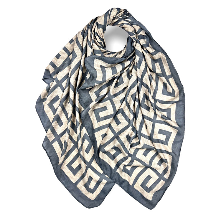 Wrap yourself in comfort and sophistication with the Maze scarf. This light grey scarf is perfect for keeping you warm while staying stylish year-round. Showcase your personality with this unique maze pattern for a one-of-a-kind look!    100% Viscose L: 180cm x W: 90cm (L: 71 inch x B:35 inch)  Weight: 100 grams