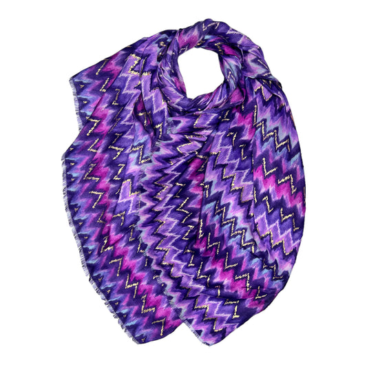 This beautiful scarf is crafted from a cotton blend fabric, featuring a stunning wave pattern in a vibrant purple The fringed ends and vibrant colour add a stylish accent to any outfit.
